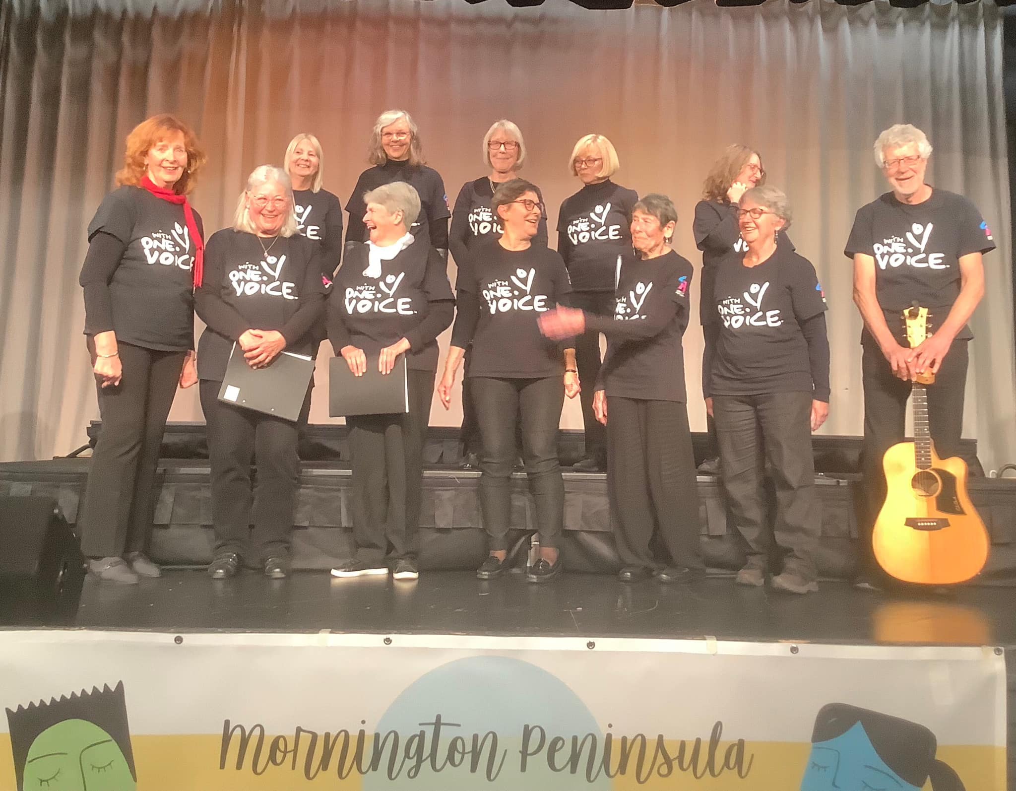 Ashburton community choir performing with conductor